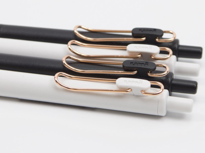 Clip Uniball One en oro rosa
